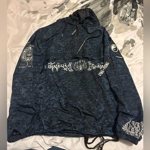 Used excellent condition “resonate” black/blue camo windbreaker. Size M Men’s.